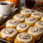 Pumpkin cinnamon rolls with coffee maple frosting