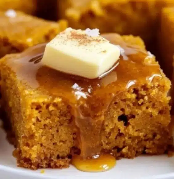 Delicious pumpkin cornbread served with cinnamon honey butter